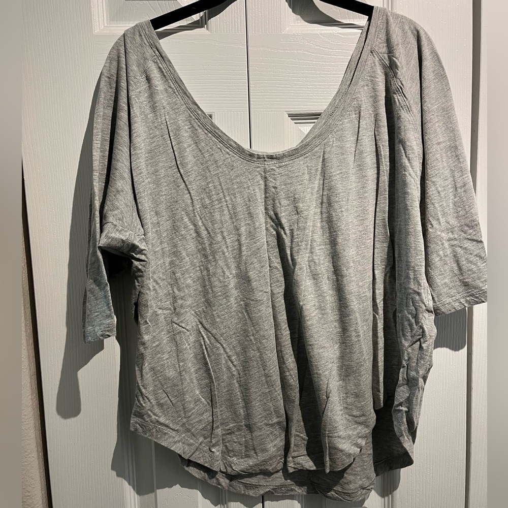 Fabletics top with wide scoop v neck and curved hem
